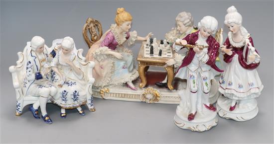 A French porcelain conversation group and three other pieces